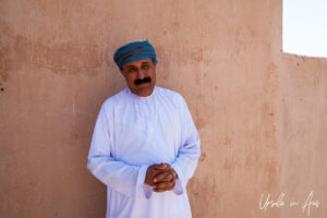 Portrait: Omani man in a turban, Bait Al Na’aman, Oman