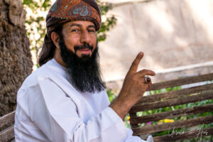 Portrait: Bearded Omani man in a massar, Al Hazm Castle, Oman