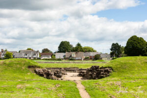 The Roman ruins and modern housing, Caerleon Wales.