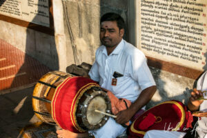 Indian man drumming, Kapaleeshwarar Temple, Chennai, Tamil Nadu