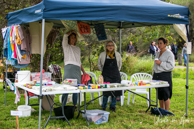Women at a fabric-stamping booth, Ephemeral, Panboola Wetlands, NSW Australia