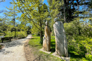Sculpture of two stylised people, VanDusen Gardens, Vancouver BC Canada.