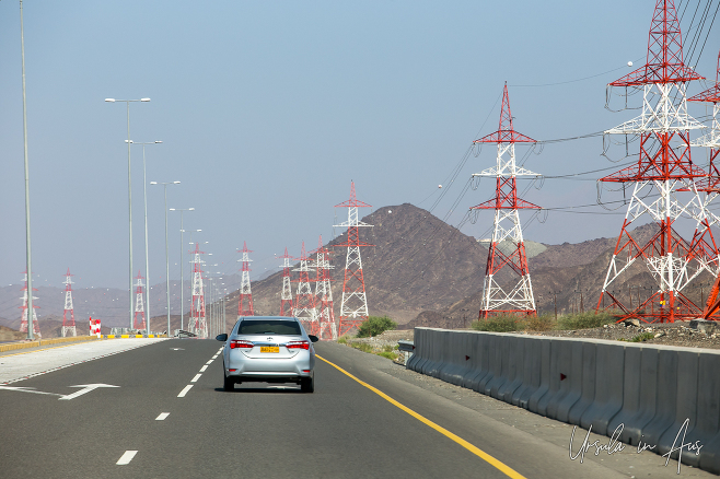High-tension power lines, viewed from the car, Dakhiliyah Governorate Oman