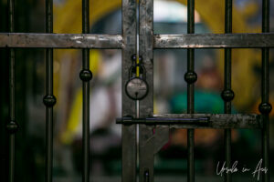 Metal locked gate, Vedapureeswarar Temple, Pondicherry India.