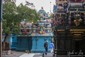 Visitors walking inside Vedapureeswarar Temple, Pondicherry India.