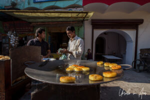 Vegetable patties on a large outdoor fryer, Haridwar, India