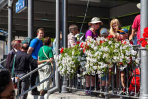People in a queue, Alpnachstad PB Switzerland.