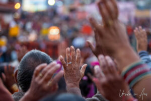 Detail: Hands in the air, Haridwar Ghats, India