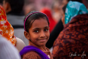 Environmental portrait: Smiling Indian girl, Haridwar India