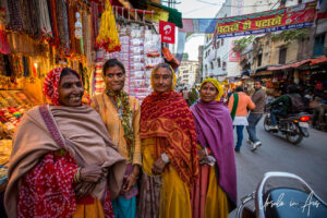 Indian women in front of a gold shop, Haridwar.