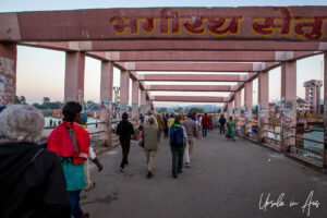 Walkers on the Shiv Setu Bridge over the Ganges, Haridwar, India