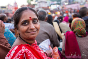Environmental portrait: Smiling Indian woman, Haridwar India