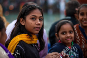 Environmental portrait: a young woman in the crowd, Haridwar ghats India