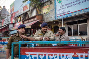 Environmental portrait: Three Indian policemen, Har Ki Pauri, Haridwar