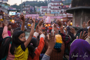 Young girl in a crowd on the ghat opposite Har Ki Pauri, Haridwar, India