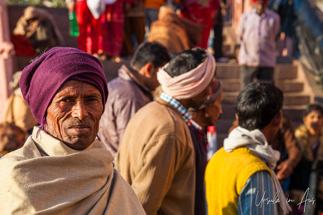 Environmental portrait: Indian man in a purple hat, Haridwar