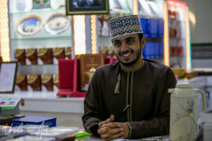 Environmental portrait: Man in a Kuma, Nizwa Souq, Oman.