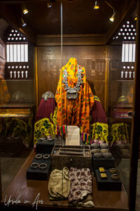 A display of clothing and ornaments, Nizwa Fort, Oman