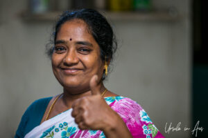 Portrait: thumbs up from a Tamil woman, Cuddalore, Tamil Nadu India