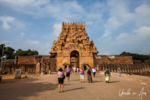 Tourists on the path leading to the entry into Brihadishvara Temple, Thanjavur India