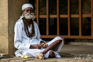Environmental portrait: man in a white dhoti, Brihadisvara Temple, Thanjavur India
