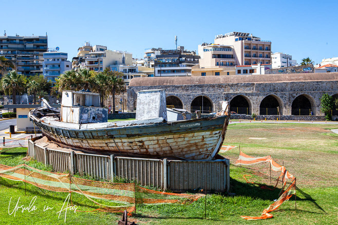Historical wooden boat on the grass, Heraklion Crete Greece.