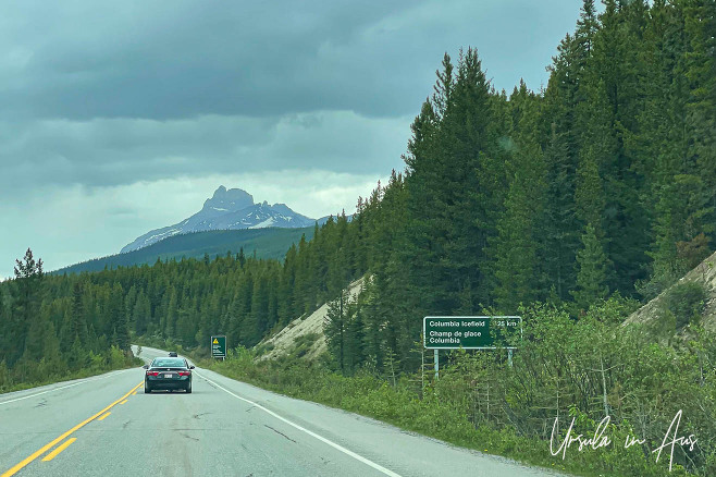 Highway and signpost near the beginning of Highway 93N, Banff Alberta Canada