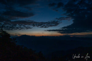 Landscape: Midnight blue sky with a pink horizon over the Himalaya, Kunjapuri Temple, Uttarakhand, India