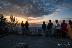 People silhouetted against the morning sunrise, Kunjapuri Temple, Uttarakhand, India