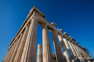 Columns of the Parthenon against a blue sky, the Acropolis, Athens, Greece.