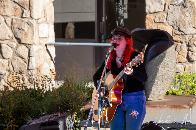 LilG on guitar in the Village Square, Thredbo Australia