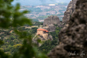 View of Holy Monastery of Roussanоu Saint Barbara from a walking track, Meteora, Greece