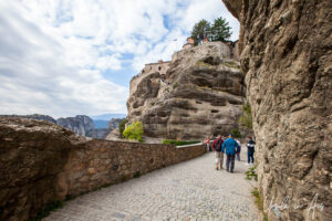 Tourists on the walkway to Varlaam Monastery, Meteora, Greece