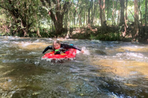 A tourist on a raft, the Mossman River, Queensland Australia