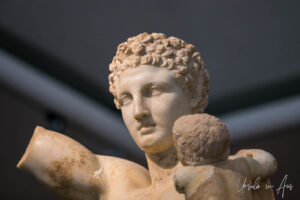 Detail: Heads of the statue of Hermes with the infant Dionysus, Museum of Olympia, Greece