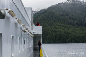 People on a wet BC Ferry, Inside Passage, Canada.