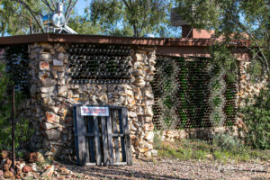 Wall built from stone and bottles, Lightning Ridge, NSW Australia