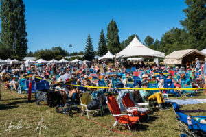 Empty chairs and some seated audience, Vancouver Island Musicfest, Comox BC Canada