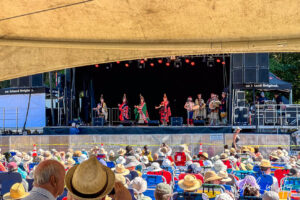 Seated audience, with the Kumugwe Dancers on the main stage, Vancouver Island Musicfest, Comox BC Canada