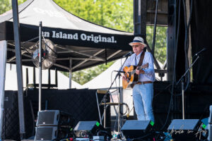 John McLachlan performing on the Concert Bowl Stage, Vancouver Island Musicfest, Comox BC Canada.