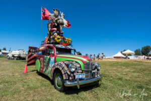1951 Austin panel van with a stuffed moose on the roof, Vancouver Island Musicfest, Comox BC Canada.