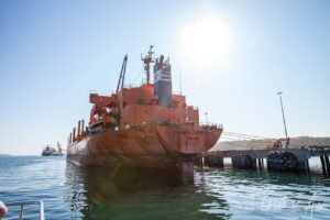 Orange freighter, Navy Dock, Eden Harbour, NSW Australia