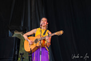 Belén Rojas singing on stage, Vancouver Island Musicfest, Comox Canada