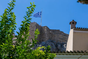 Flag on the Acropolis from Plaka Centre, Athens Greece