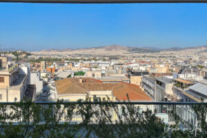 Blue sky and the rooftops of Athens from the Hotel Electra, Greece