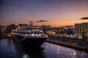 A Blue Star ferry in pre-dawn Piraeus Port, Athens