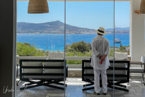 Woman looking over the sea from the Agnanti Hotel, Paros Greece
