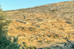 Rocky walls along the Byzantine Road, Lefkes Paros Greece.