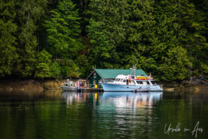 Green-roofed floating boathouse, Khutzeymateen Chanel, BC Canada