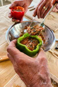 Close-up: hands chopping green herbs, Platia, Naxos Greece